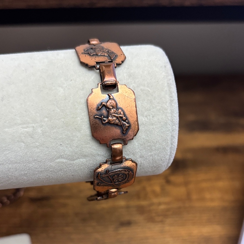 Engraved Copper Bracelet with Equestrian Motifs